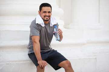 Man drinking water after working out © AntonioDiaz