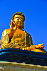 Golden Buddha statue at a Chinese temple in Kaohsiung, Taiwan.