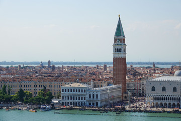 Fototapeta na wymiar Aerial view over skyline of Venice at St Marks Place with Campanile and Doge Palace