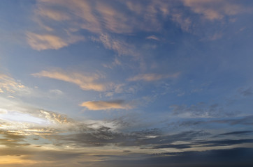 Naklejka na ściany i meble Evening sunset with cloudy skies