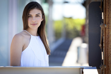 Portrait Of A Young Woman Smiling Outside