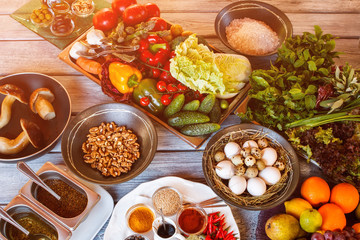 Bowl of walnuts and eggs. Herbs with vegetables and spices. This year's harvest is rich. Eat well and be healthy.