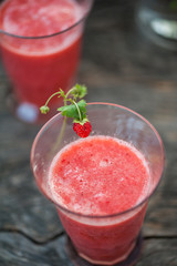 Watermelon juice on a wooden table