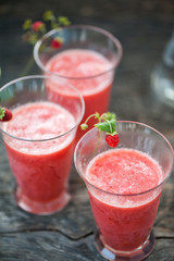 Watermelon juice on a wooden table