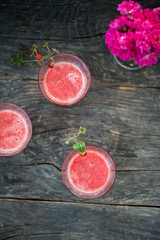 Watermelon juice on a wooden table