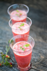 Watermelon juice on a wooden table