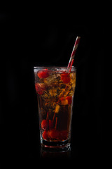 Refreshing cold cherry cola on the background