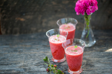Watermelon juice on a wooden table