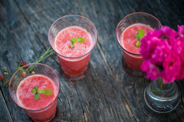 Watermelon juice on a wooden table