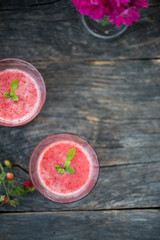 Watermelon juice on a wooden table