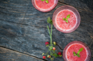 Watermelon juice on a wooden table