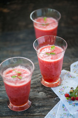 Watermelon juice on a wooden table