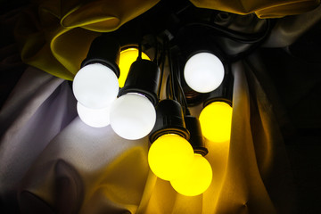 Close up of decorative light bulb on dark background