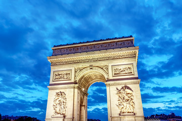 Fototapeta na wymiar The famous Arc de Triomphe in Paris at dawn
