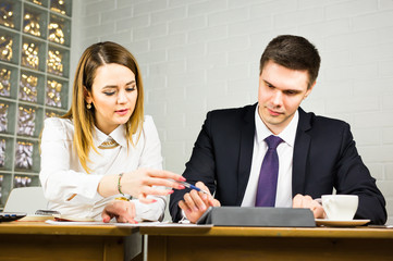 business couple working together on project at office