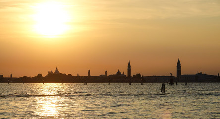 Fototapeta premium Wonderful sunset over the city of Venice - Skyline in the backlight