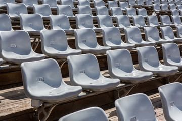 Rows of seats in an open-air theater