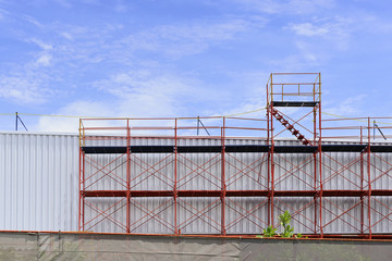 The red scaffold at the factory building between renovate proces
