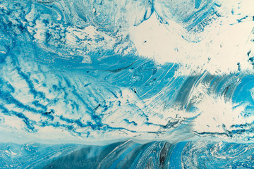 Fototapeta na wymiar Blue marbling texture. Creative background with abstract oil painted waves, handmade surface. Liquid paint.