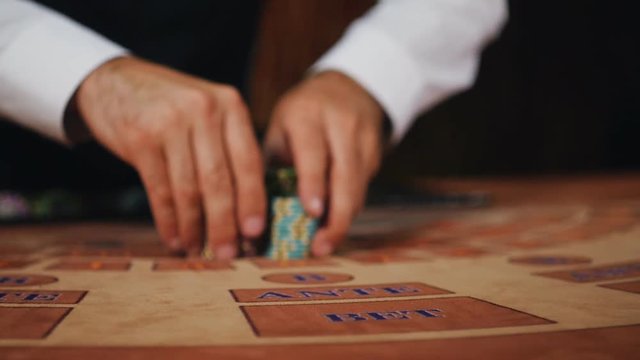 Luck smiled player. The dealer moves the player's winnings