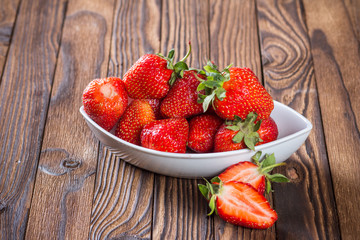 fresh strawberries in a dish on the table