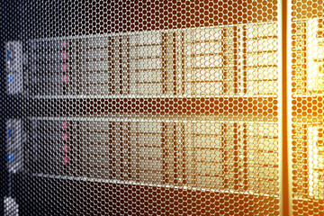 computer server in rack with blue light close up