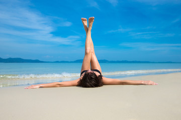 Fototapeta na wymiar woman relax on the beach
