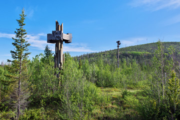 Stela with the name at the entrance to the territory of the Murmansk region of Lapland Nature...