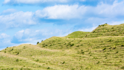 Ramparts of Iron Age fort on Battlesbury Hill, Wiltshire, UK. Ancient defensive construction on hillside, on the edge of Salisbury Plain near Warminster, England