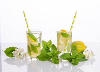 Summer lemonade with Lemon and mint isolated on white