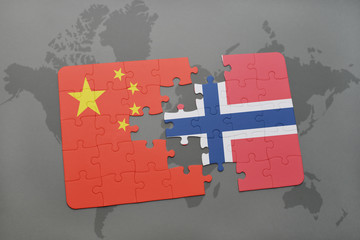 puzzle with the national flag of china and norway on a world map background.