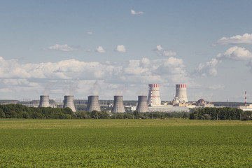 Pipes of power plant near the field