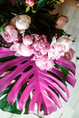 Bouquet of peonies in workshop