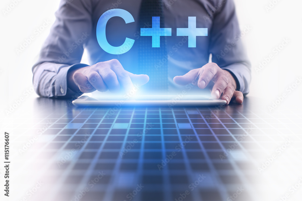 Poster businessman is pressing button on tablet pc and selecting c++.
