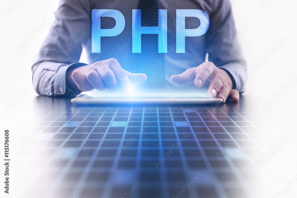 Wall mural businessman is pressing button on tablet pc and selecting php.