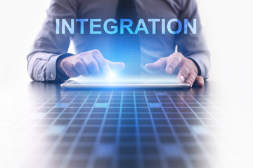 Businessman using modern tablet pc and selecting Integration.