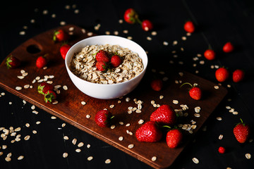 Healthy breakfast, muesli, granola with strawberries, health and