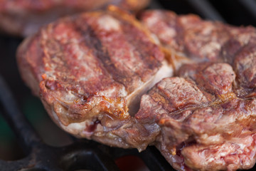 Ribeye steak on a grill