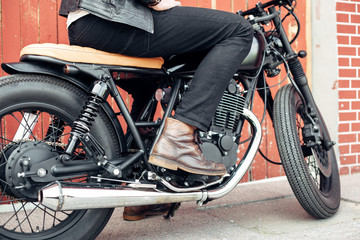 Fototapeta na wymiar Biker and vintage custom motorcycle