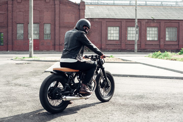 Fototapeta na wymiar Biker and vintage custom motorcycle