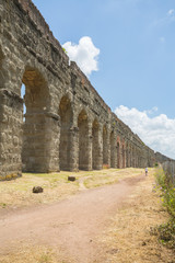 Ruins of the Aqua Claudia in Parco degli Acquedotti in Rome, Italy
