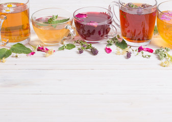 herbal tea on a white wooden background