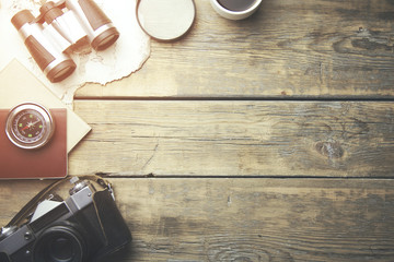 travel items on wooden background