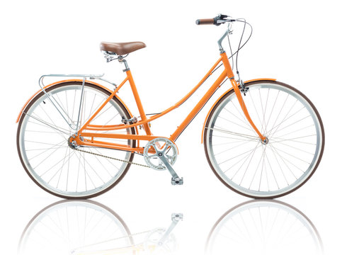 Fototapeta Stylish female orange bicycle isolated on white