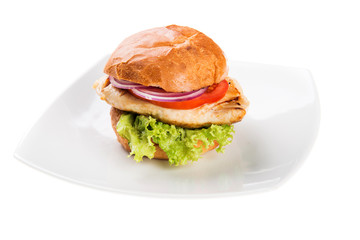 Delicious chicken burger with lettuce and tomato isolated on white background