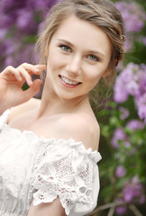 Young beautiful bride in the garden