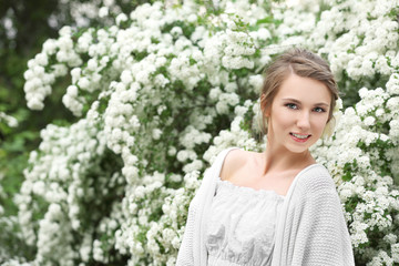 Young beautiful bride in the garden