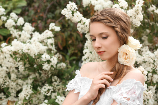Young beautiful bride in the garden