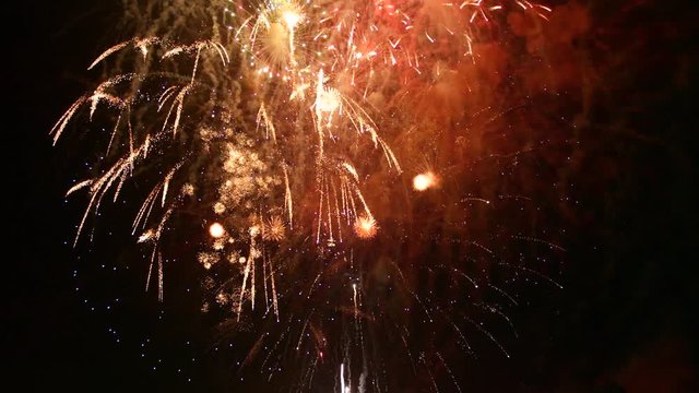 Fireworks finale over dark background