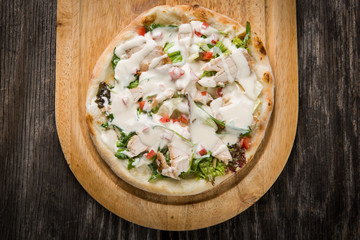 Pizza with chicken breast and bechamel sauce